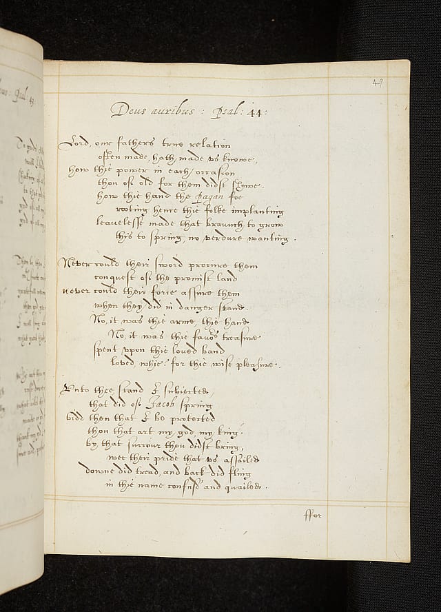 Elegant handwriting in an old notebook.