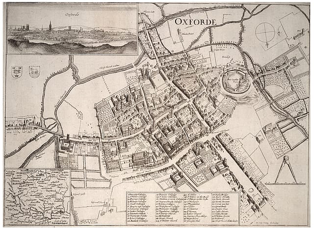Old, discoloured map of a city.