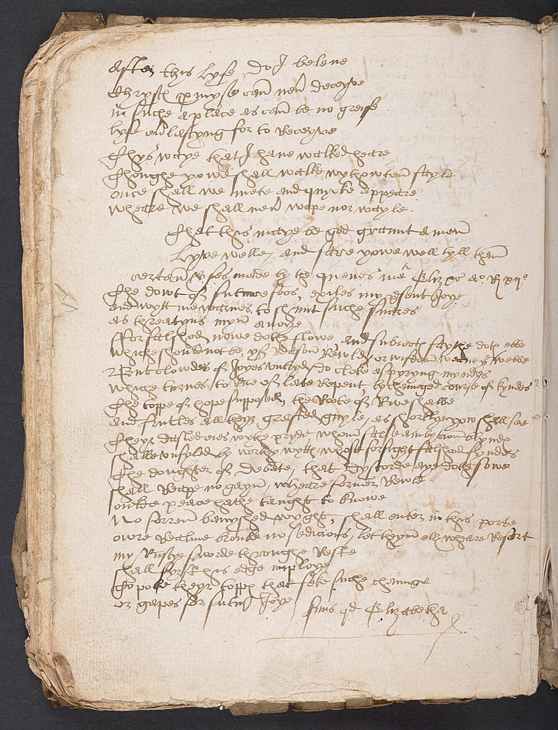 Page from an old notebook covered in elegant, neat handwriting.