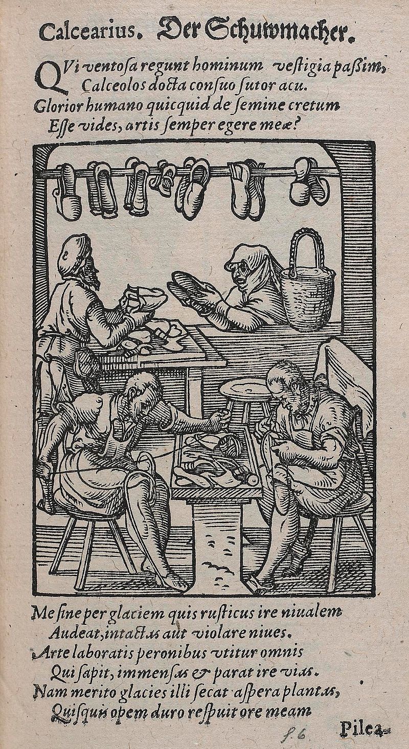 Page from an old book with lines of printed text and an engraving depicting two people at a table making shoes. A man in the background appears to be selling a pair of shoes to another figure.